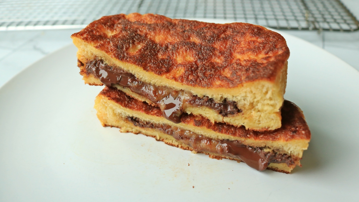 Stuffed French toast oozing chocolate.