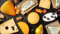 Cheeses on a black background