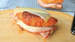 Croque monsieur on a cutting board.