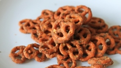 Mini pretzels on a white plate.