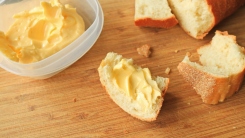 Bread chunks with butter slathered on top.