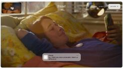 A screenshot of the friend.com homepage showing a woman "talking" to her Friend pendant 