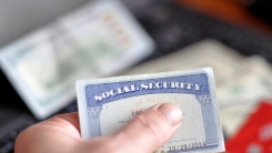 Person holding social security card