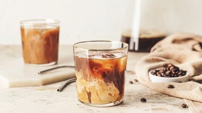 Two cold brew coffees on a table.