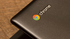 A closeup of the Chromebook logo on a Chromebook computer