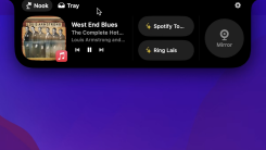 NotchNook app's expanded view showing media and shortcuts.