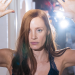 Jessica Chastain holds up her arms in a scene from Molly's Game